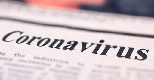 A newspaper with the headline Coronavirus